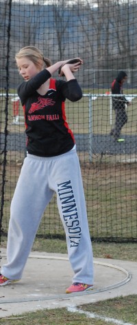 Karina Ritzman winds up for a discus toss