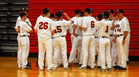 Coach Lindow (far right) encourages his team as a new season begins